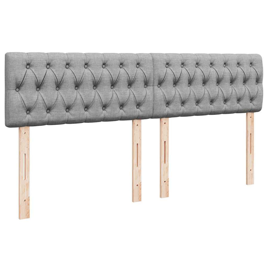 Ottoman bed met matras en LED's 160x200 cm stof lichtgrijs