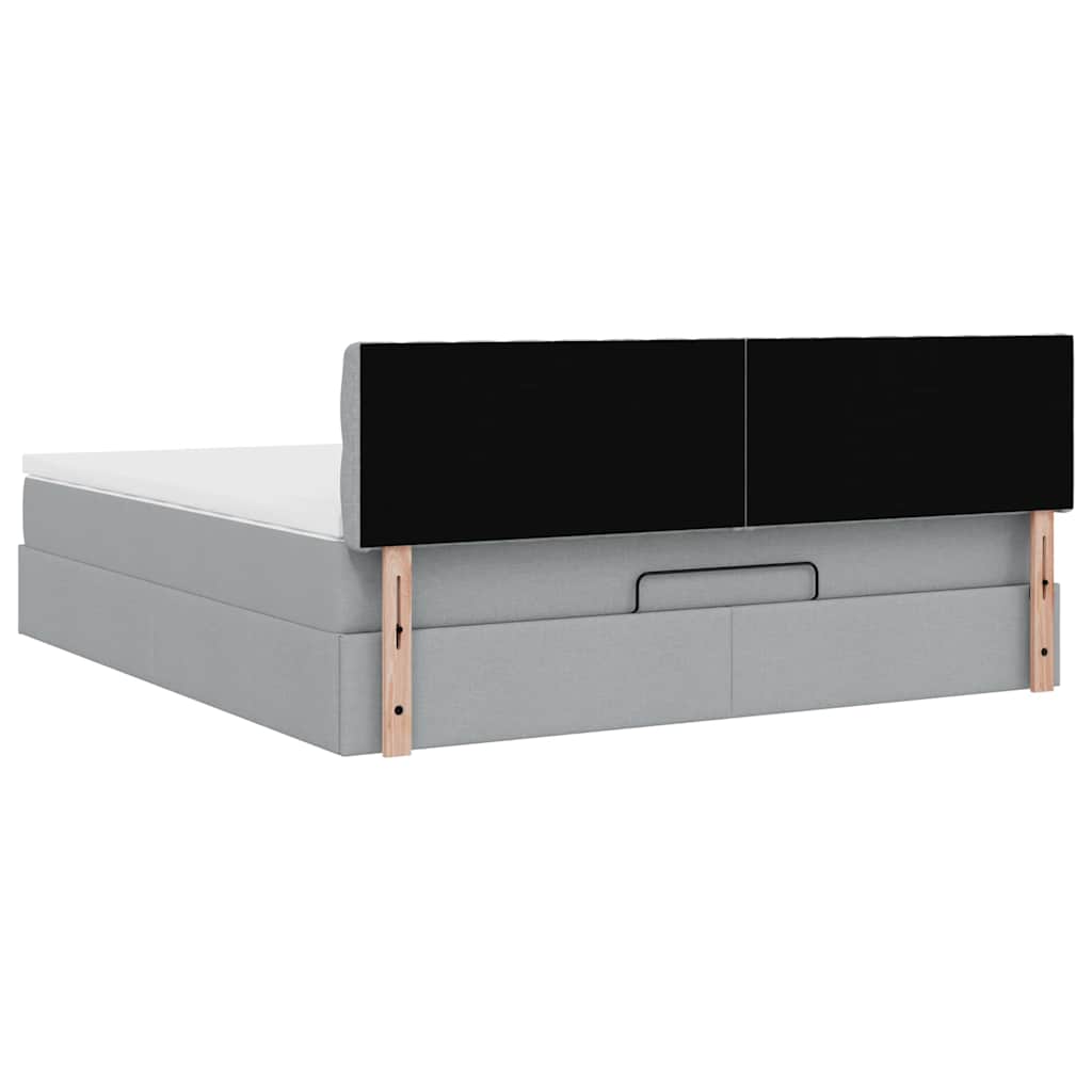 Ottoman bed met matras en LED's 160x200 cm stof lichtgrijs