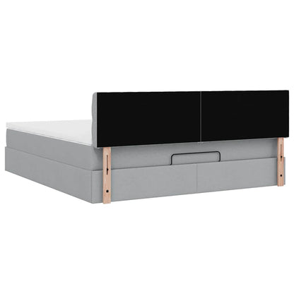 Ottoman bed met matras en LED's 160x200 cm stof lichtgrijs