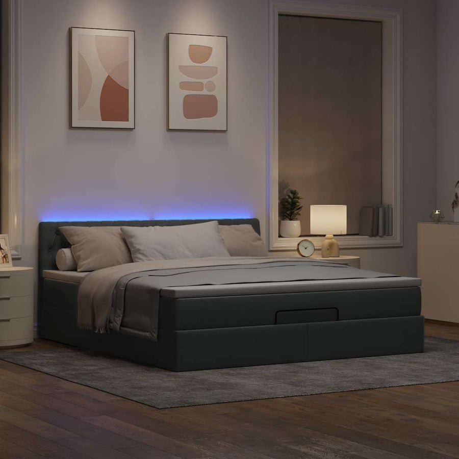 Ottoman bed met matras en LED's 160x200 cm stof lichtgrijs