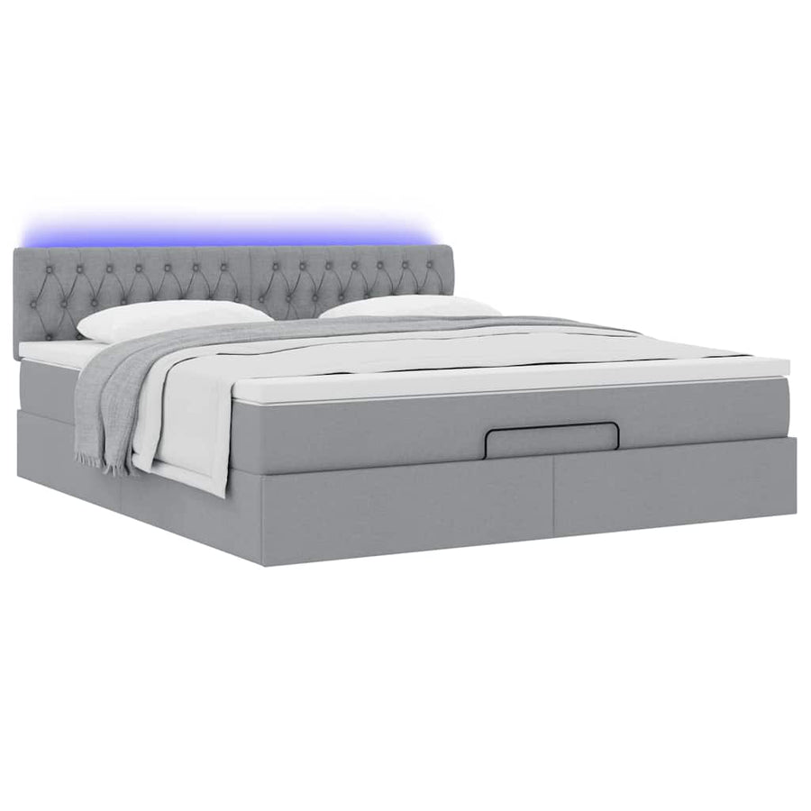 Ottoman bed met matras en LED's 180x200cm stof lichtgrijs