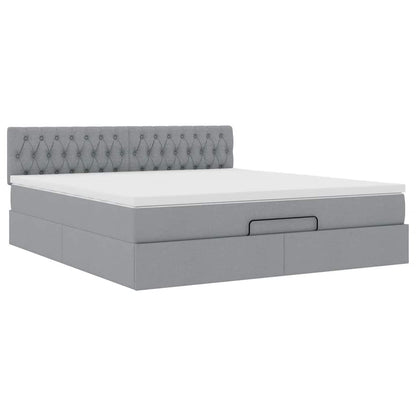 Ottoman bed met matras en LED's 180x200cm stof lichtgrijs