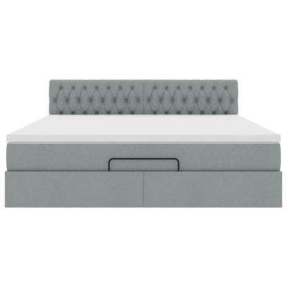 Ottoman bed met matras en LED's 180x200cm stof lichtgrijs