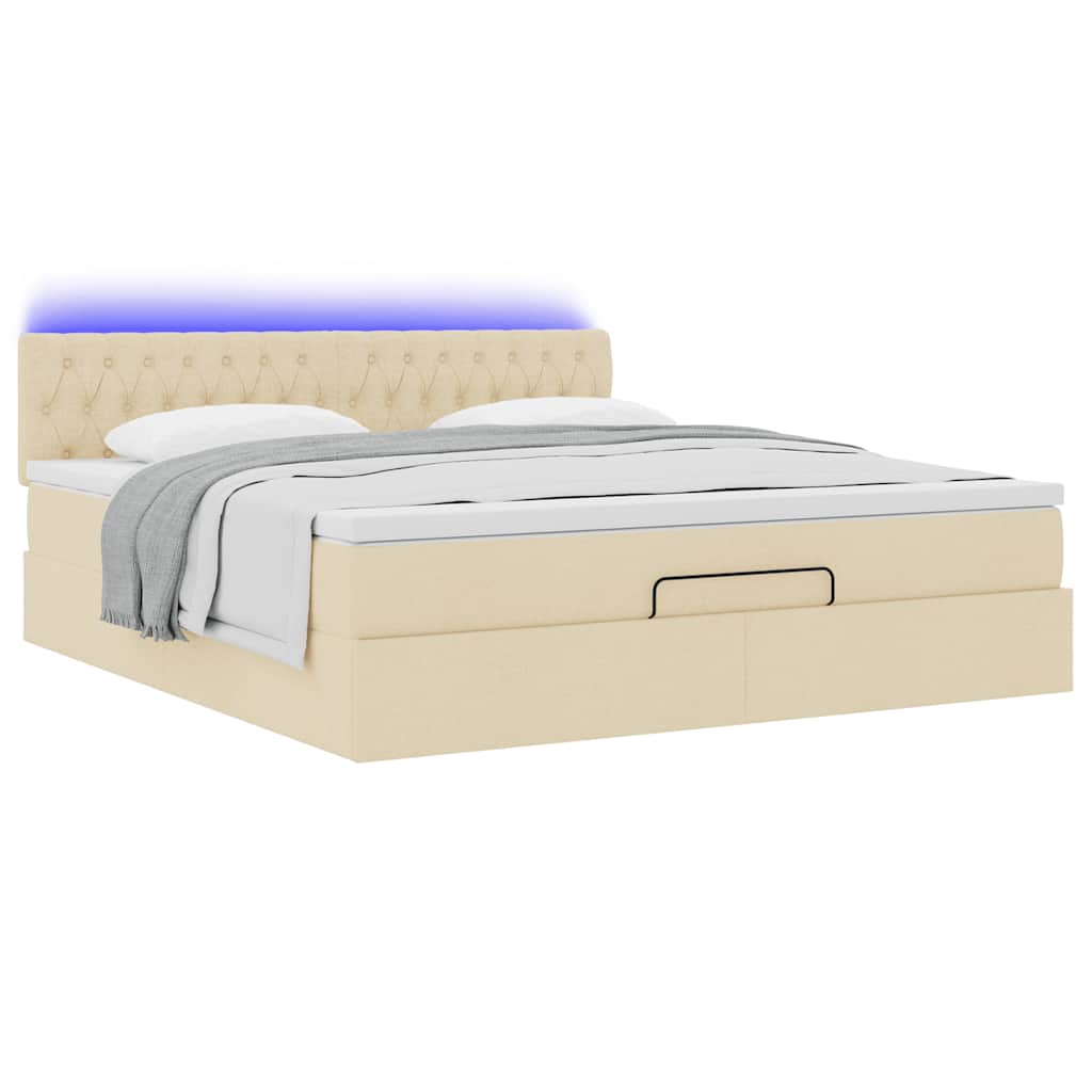 Ottoman bed met matras en LED's 180x200cm stof crèmekleurig