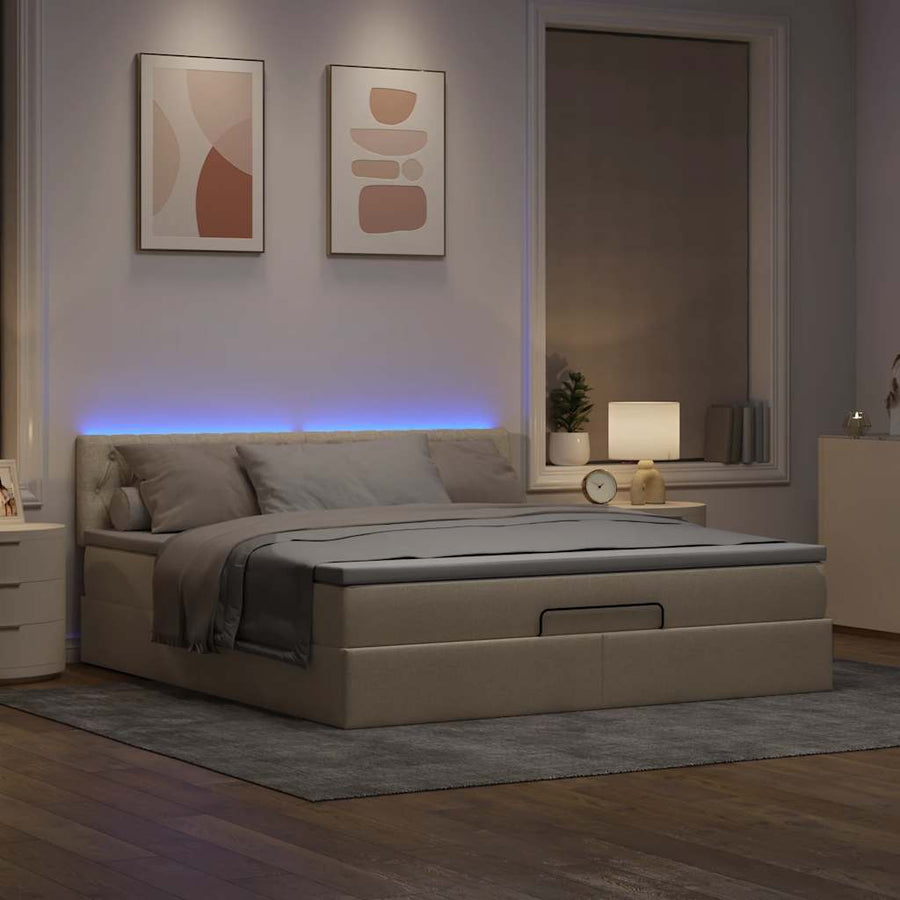 Ottoman bed met matras en LED's 180x200cm stof crèmekleurig