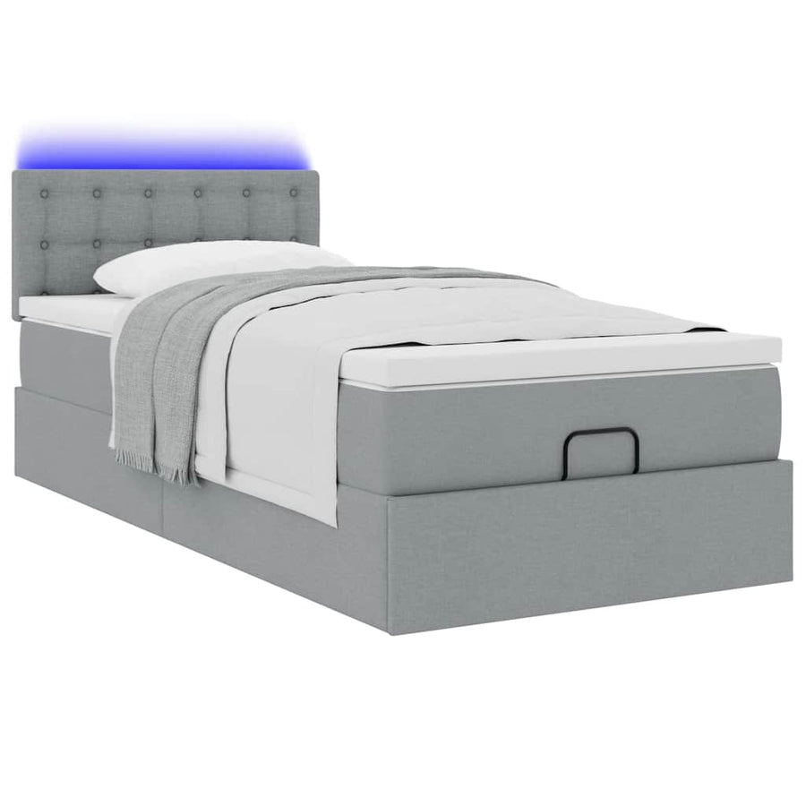 Ottoman bed met matras en LED's 90x190cm stof lichtgrijs