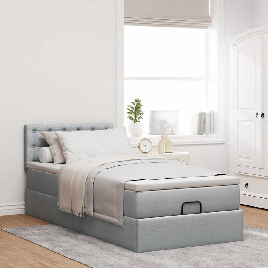 Ottoman bed met matras en LED's 90x190cm stof lichtgrijs