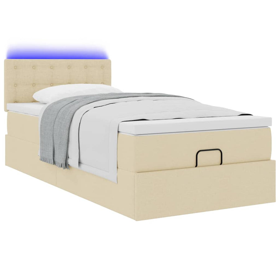 Ottoman bed met matras en LED's 90x190cm stof crèmekleurig