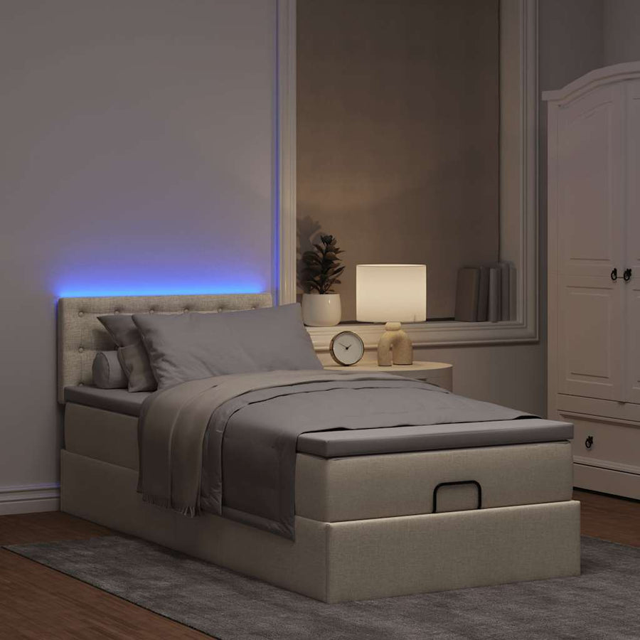 Ottoman bed met matras en LED's 90x190cm stof crèmekleurig