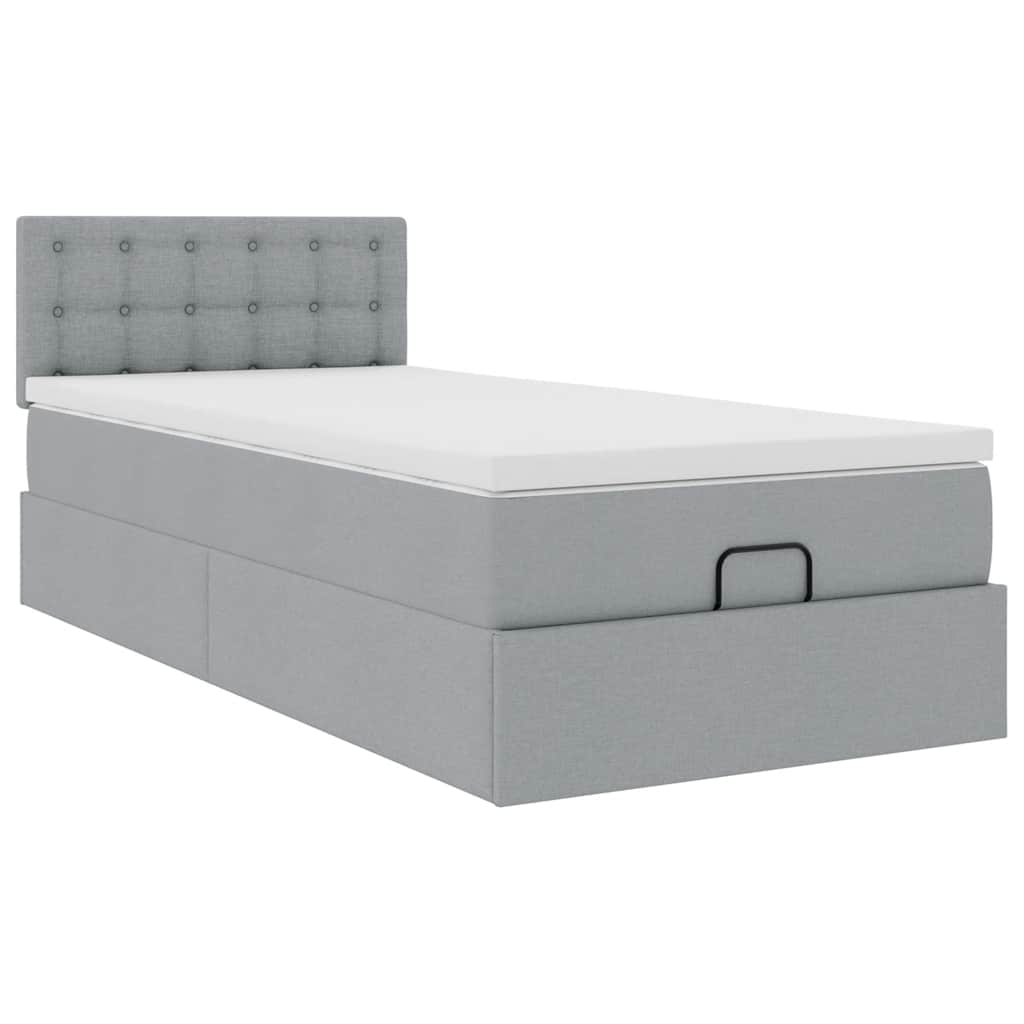 Ottoman bed met matras en LED's 90x200 cm stof lichtgrijs