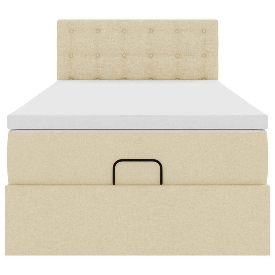 Ottoman bed met matras en LED's 90x200 cm stof crèmekleurig