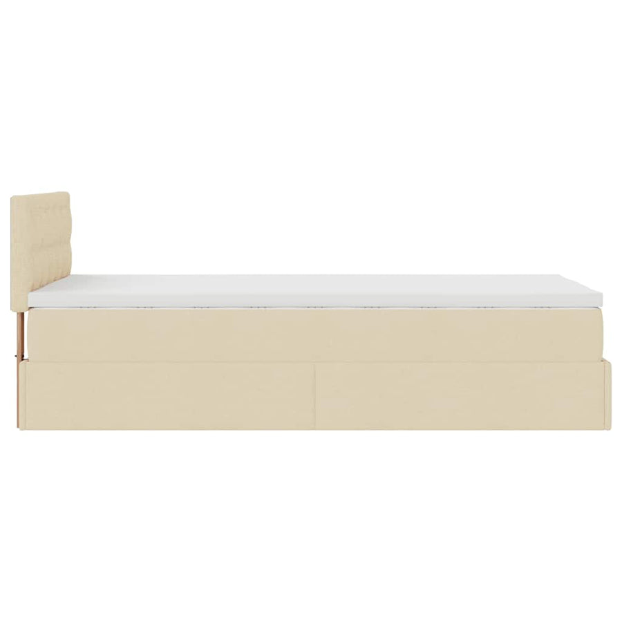 Ottoman bed met matras en LED's 90x200 cm stof crèmekleurig