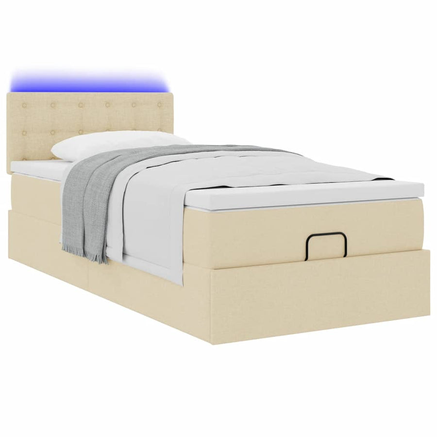 Ottoman bed met matras en LED's 100x200 cm stof crèmekleurig