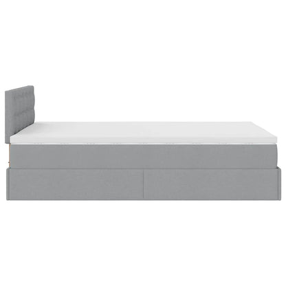 Ottoman bed met matras en LED's 120x190 cm stof lichtgrijs