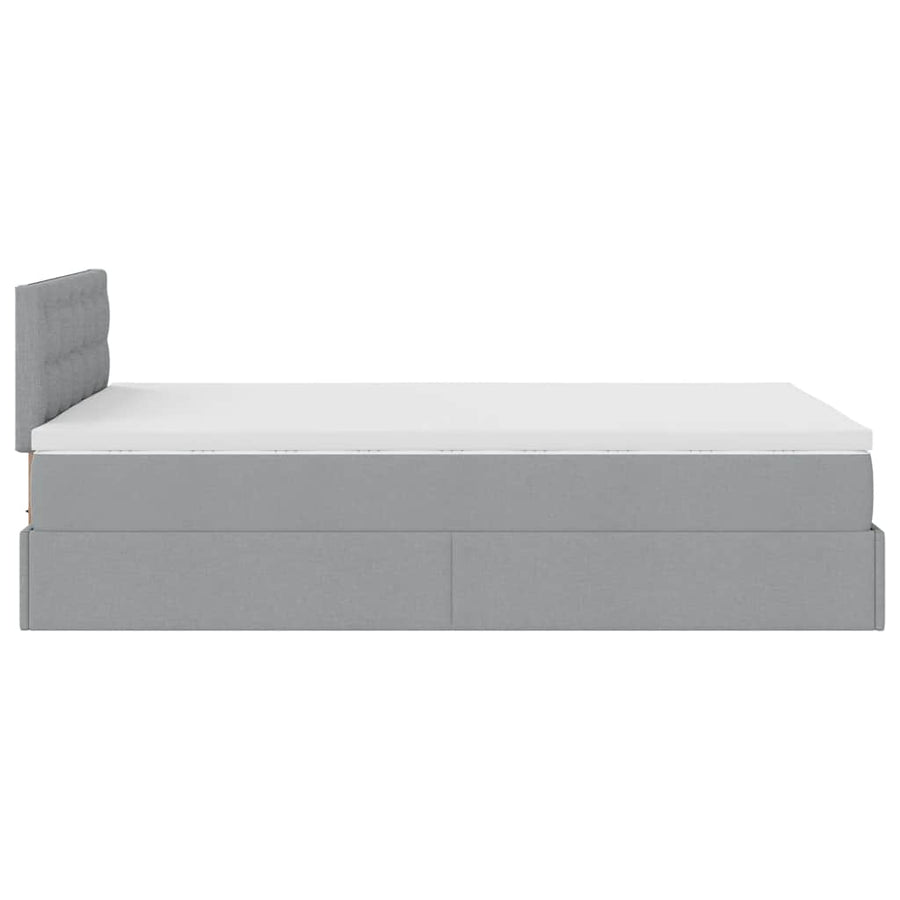 Ottoman bed met matras en LED's 120x190 cm stof lichtgrijs