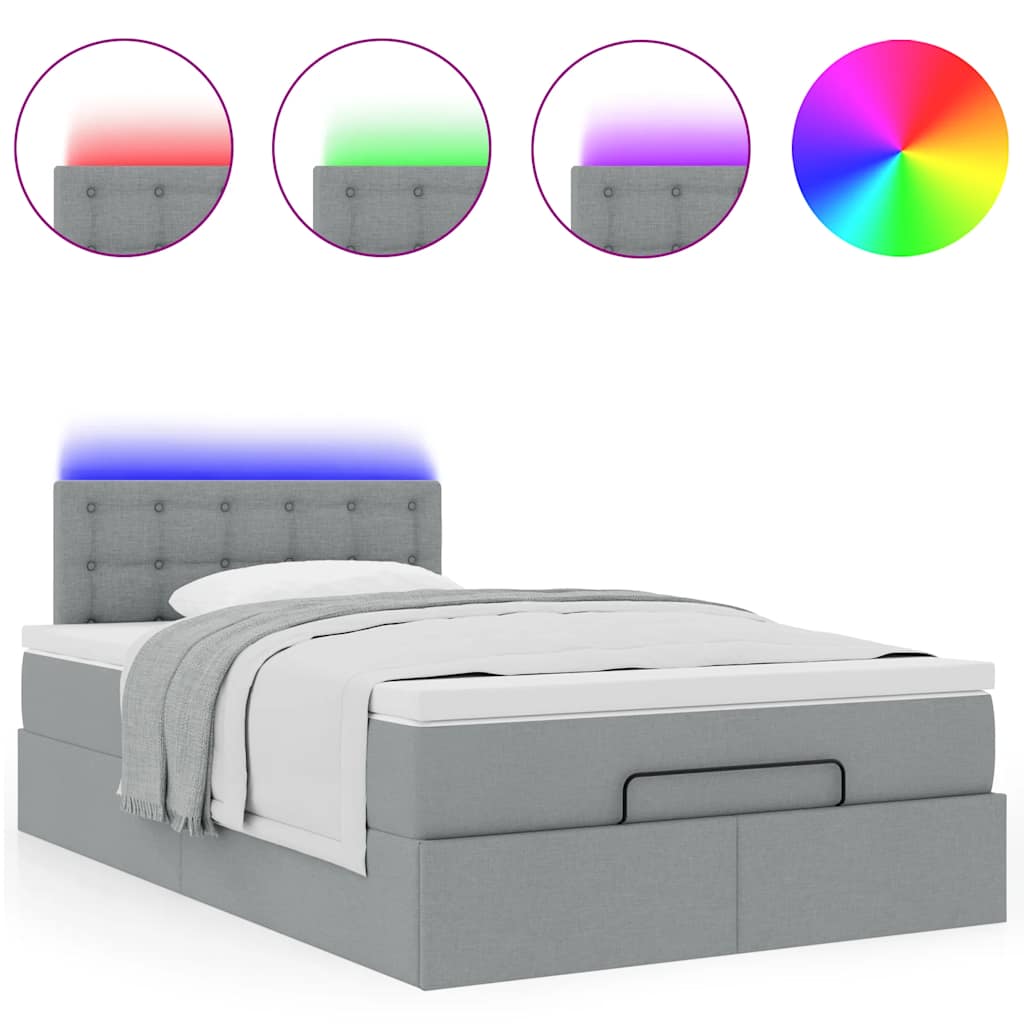 Ottoman bed met matras en LED's 120x200 cm stof lichtgrijs