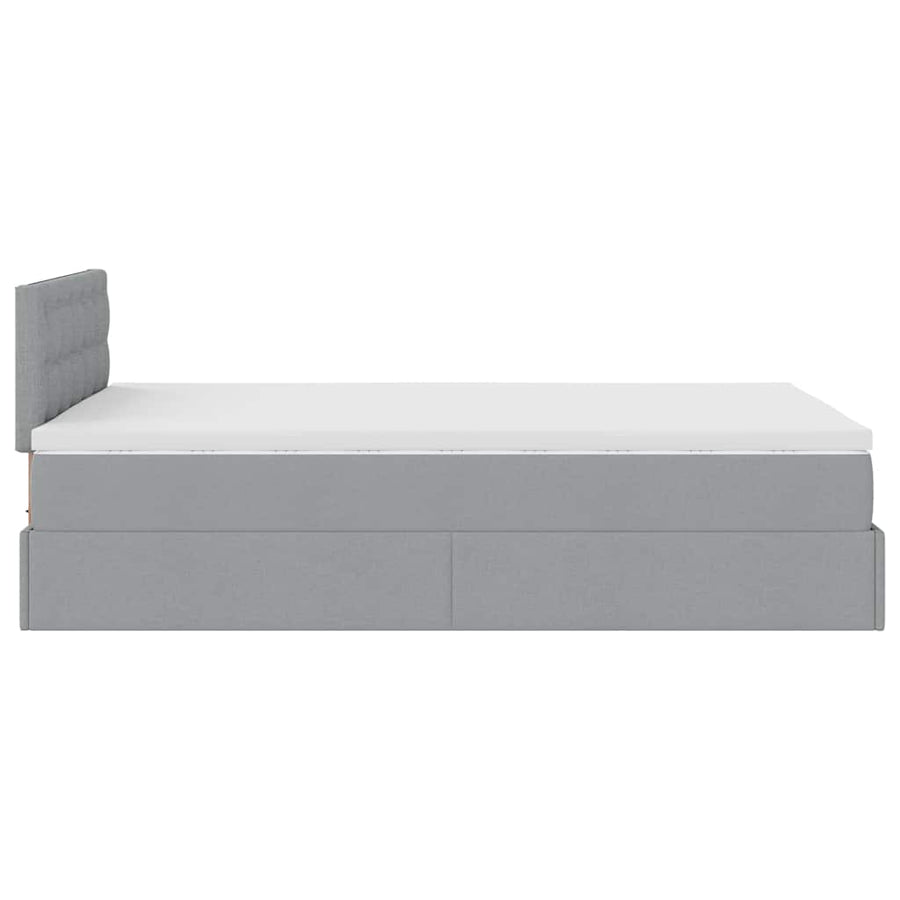 Ottoman bed met matras en LED's 120x200 cm stof lichtgrijs