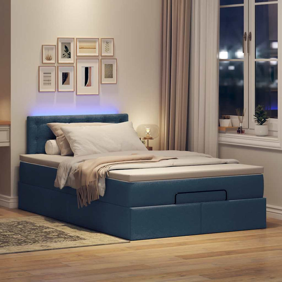 Ottoman bed met matras en LED's 120x200 cm stof blauw