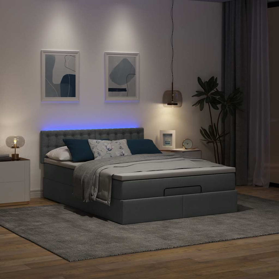 Ottoman bed met matras en LED's 140x200 cm stof donkergrijs
