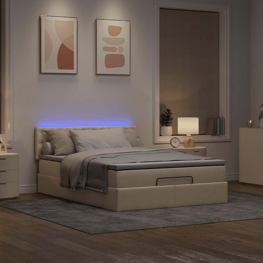 Ottoman bed met matras en LED's 140x200 cm stof crèmekleurig