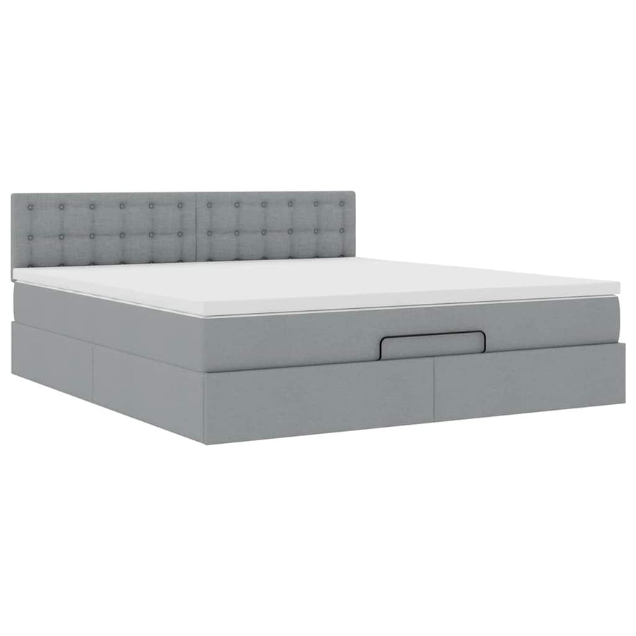 Ottoman bed met matras en LED's 160x200 cm stof lichtgrijs