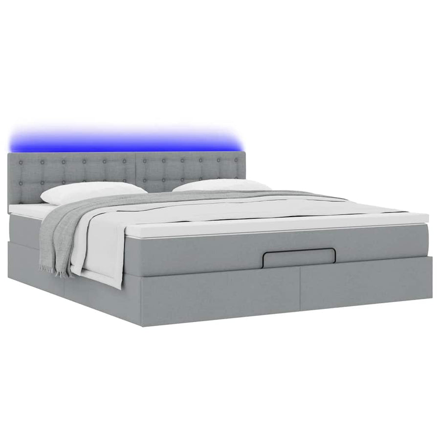 Ottoman bed met matras en LED's 180x200cm stof lichtgrijs