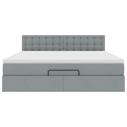 Ottoman bed met matras en LED's 180x200cm stof lichtgrijs