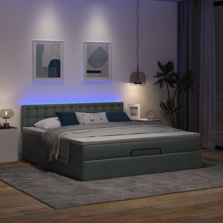 Ottoman bed met matras en LED's 180x200cm stof donkergrijs