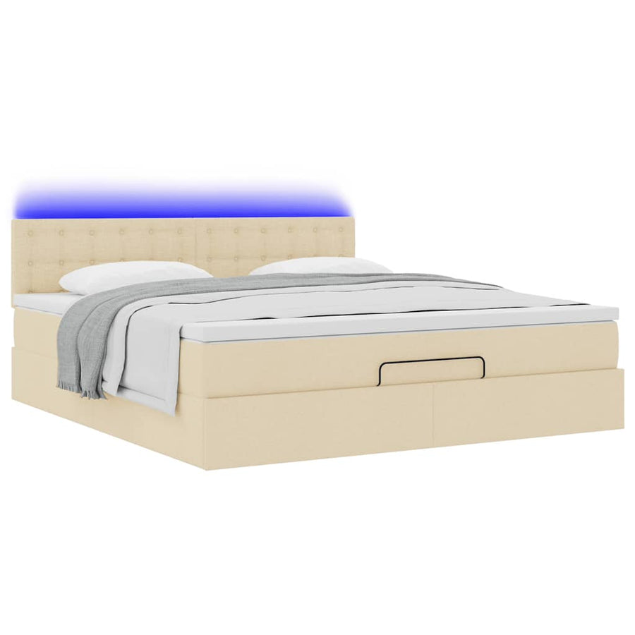 Ottoman bed met matras en LED's 180x200cm stof crèmekleurig