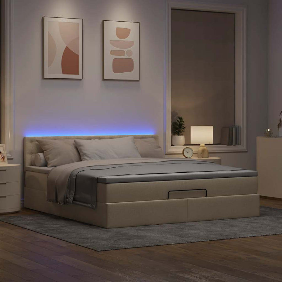 Ottoman bed met matras en LED's 180x200cm stof crèmekleurig