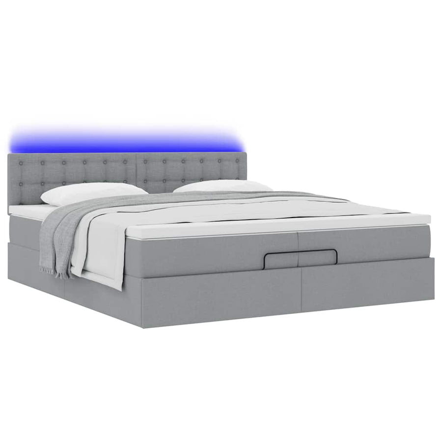 Ottoman bed met matrassen en LED's 200x200cm stof lichtgrijs