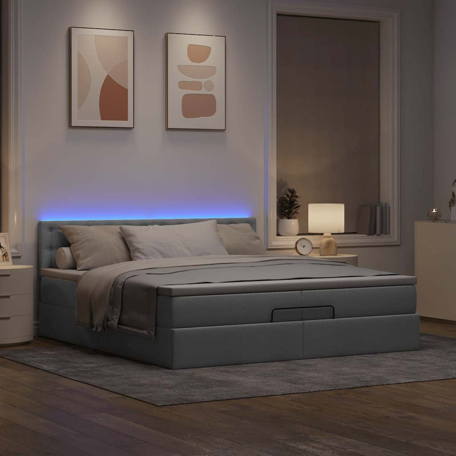Ottoman bed met matrassen en LED's 200x200cm stof lichtgrijs