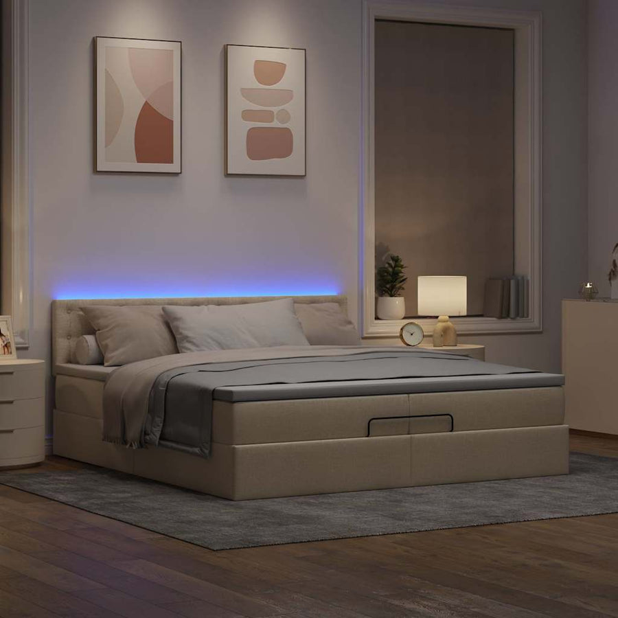 Ottoman bed met matrassen en LED's 200x200cm stof crèmekleurig