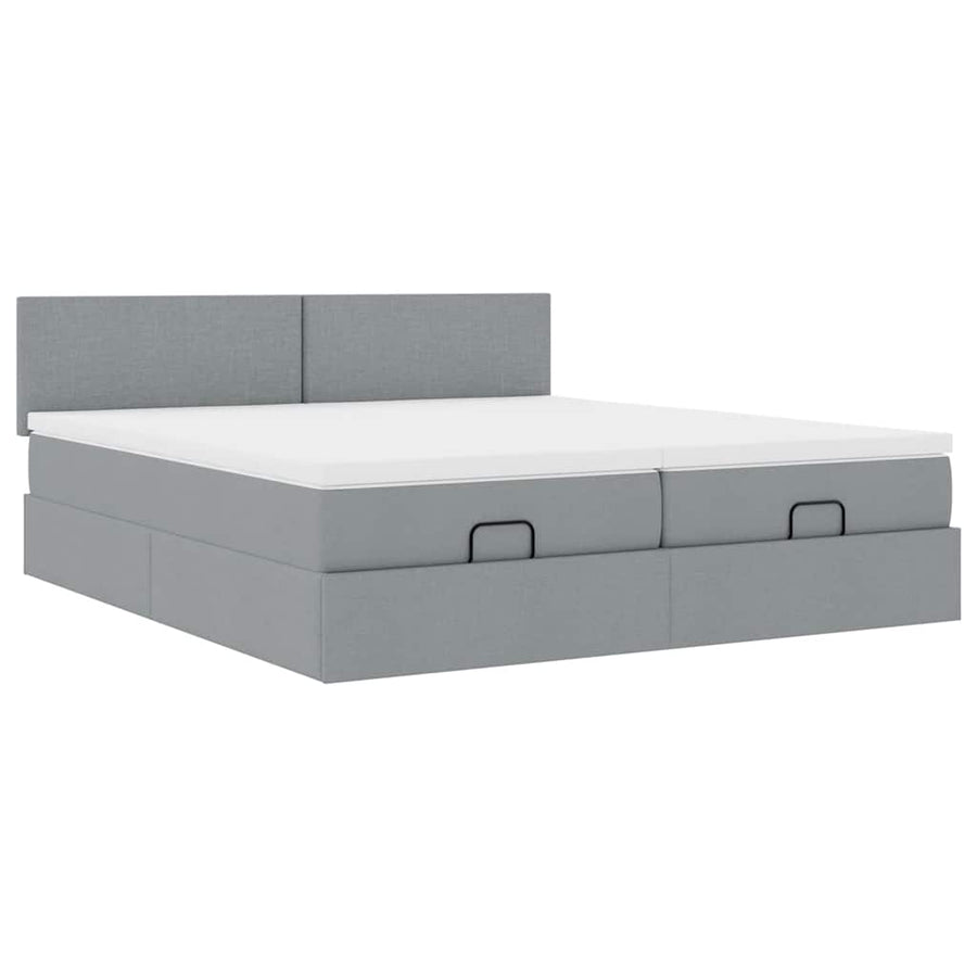 Ottoman bed met matrassen en LED's 180x200cm stof lichtgrijs