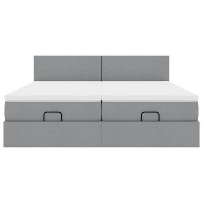 Ottoman bed met matrassen en LED's 180x200cm stof lichtgrijs