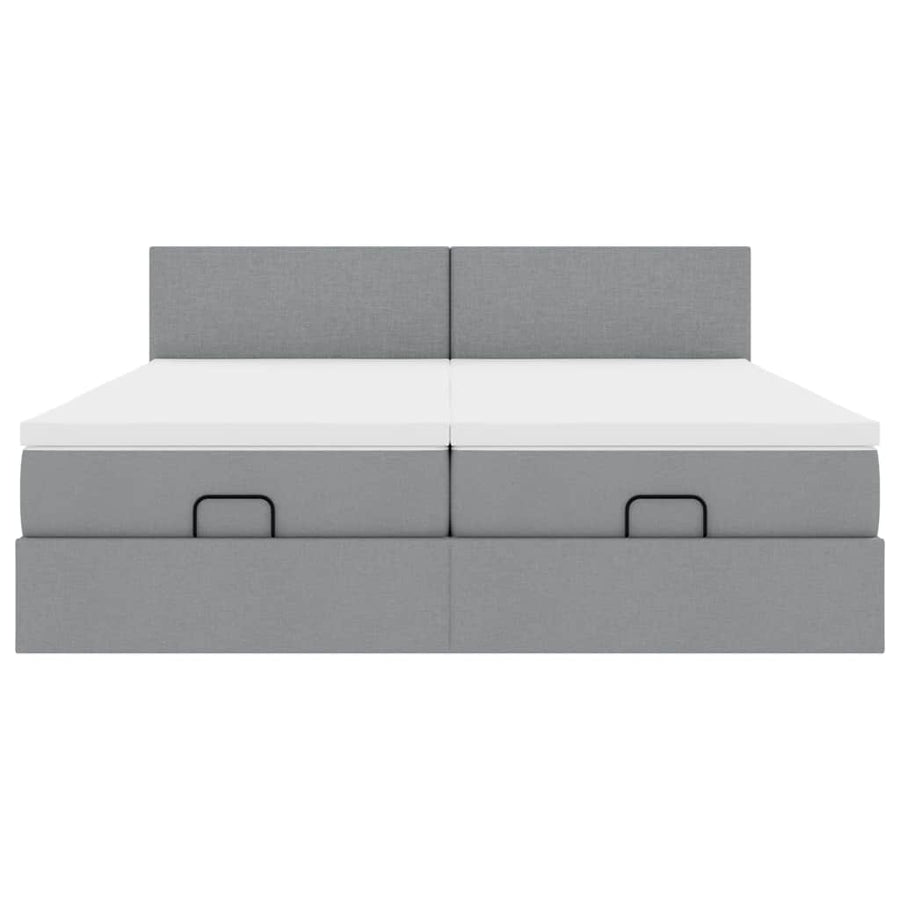 Ottoman bed met matrassen en LED's 180x200cm stof lichtgrijs