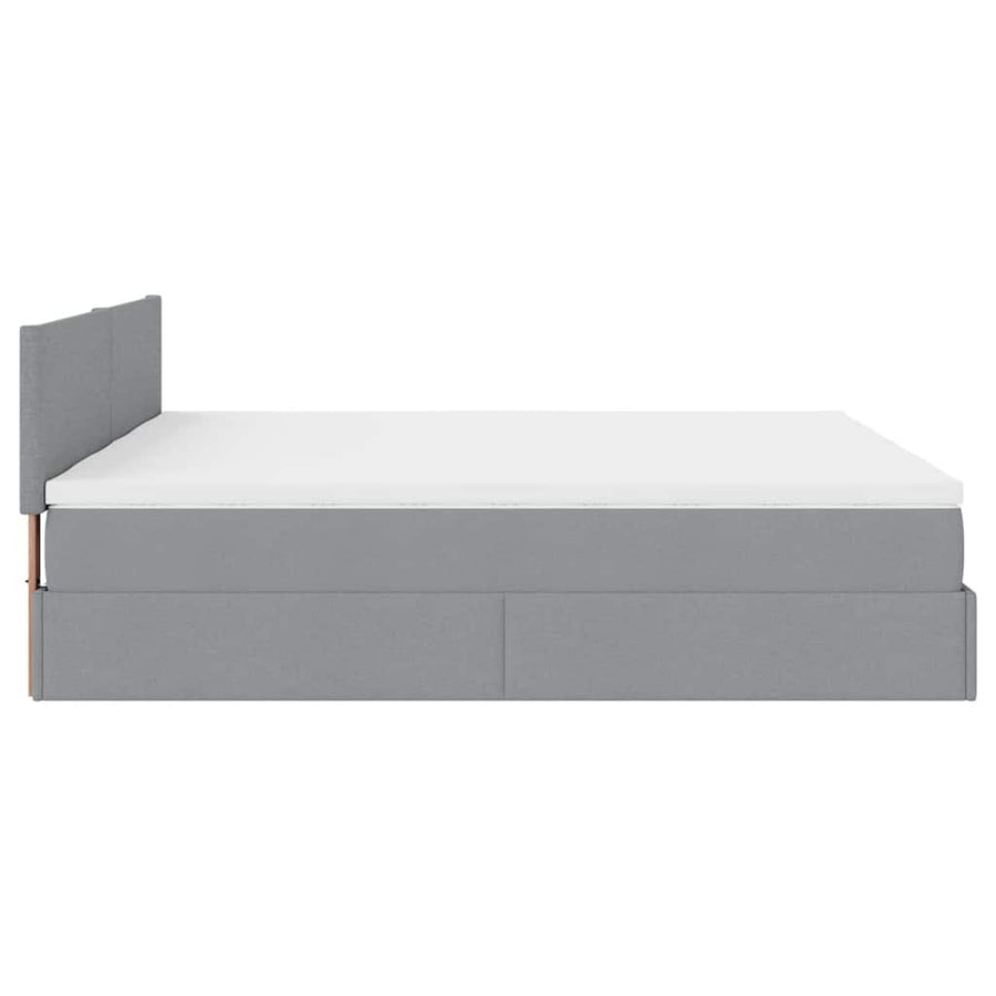 Ottoman bed met matrassen en LED's 180x200cm stof lichtgrijs