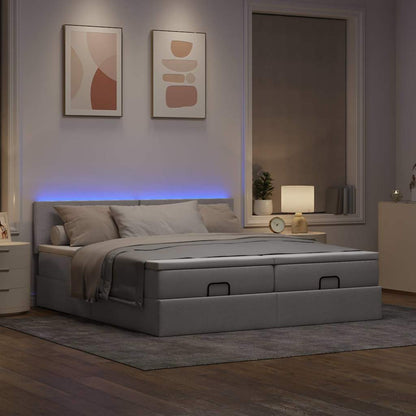 Ottoman bed met matrassen en LED's 200x200cm stof taupe