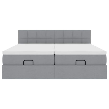 Ottoman bed met matrassen en LED's 160x200cm stof lichtgrijs