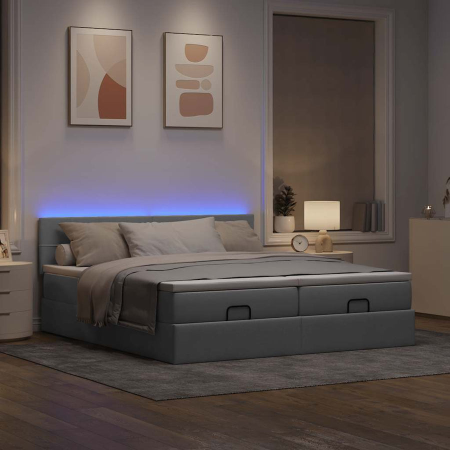 Ottoman bed met matrassen en LED's 160x200cm stof lichtgrijs