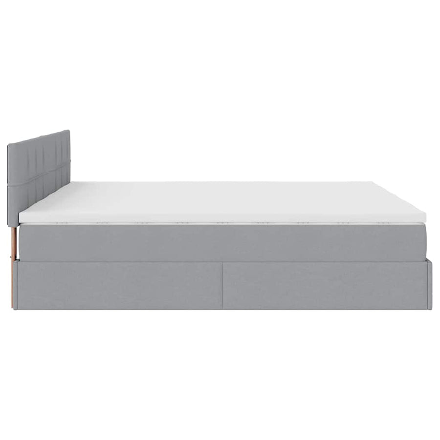 Ottoman bed met matrassen en LED's 180x200cm stof lichtgrijs