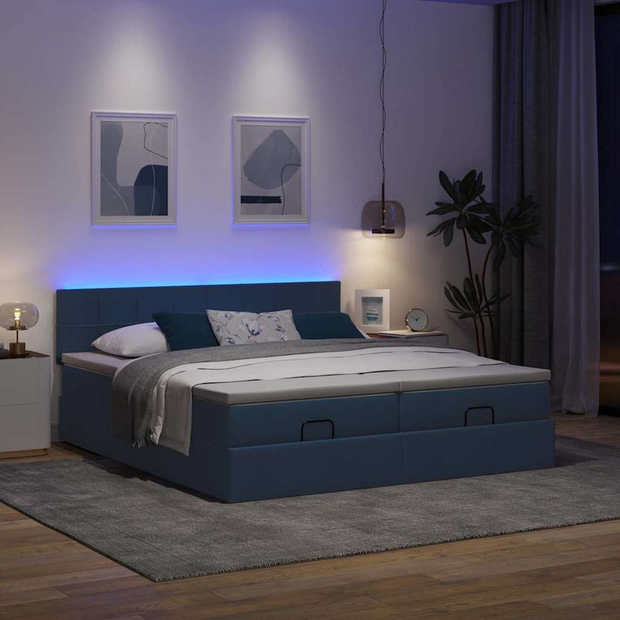 Ottoman bed met matrassen en LED's 180x200cm stof blauw