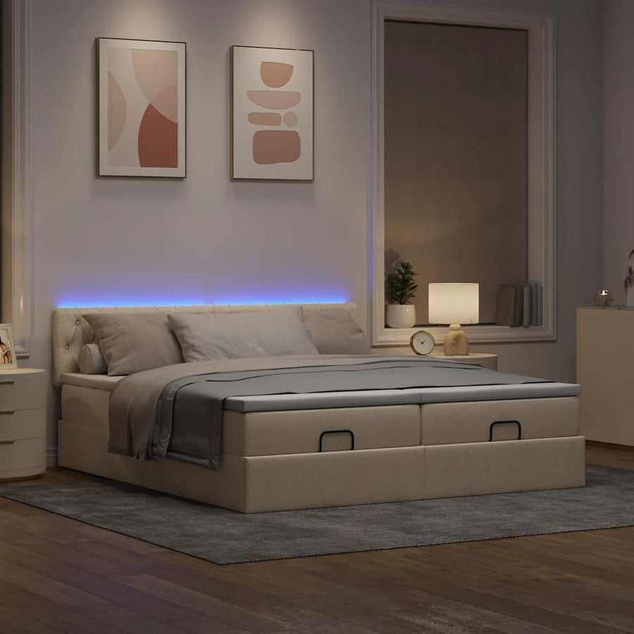 Ottoman bed met matrassen en LED's 160x200cm stof crèmekleurig