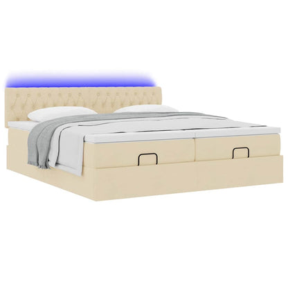 Ottoman bed met matrassen en LED's 160x200cm stof crèmekleurig
