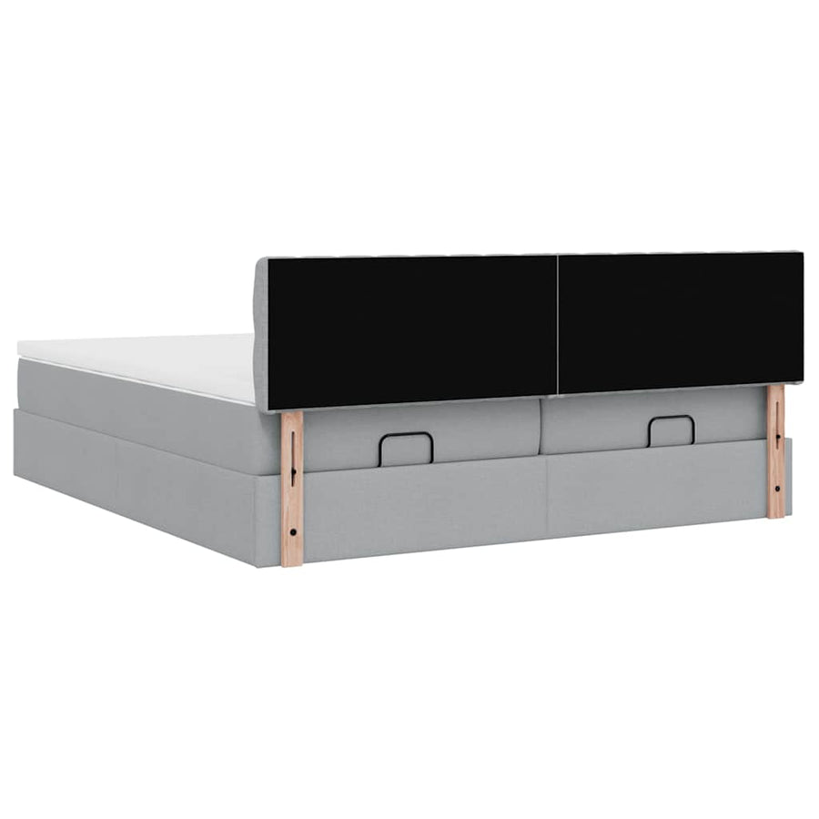 Ottoman bed met matrassen en LED's 180x200cm stof lichtgrijs