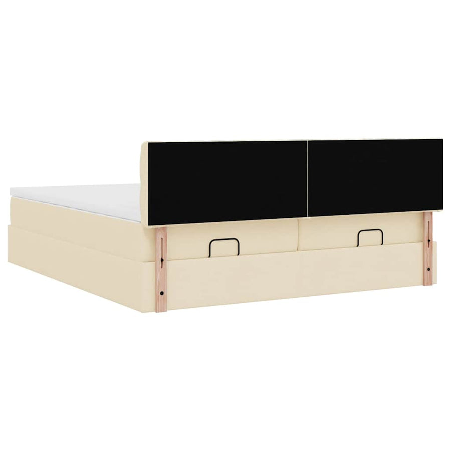 Ottoman bed met matrassen en LED's 180x200cm stof crèmekleurig