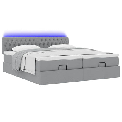 Ottoman bed met matrassen en LED's 200x200cm stof lichtgrijs