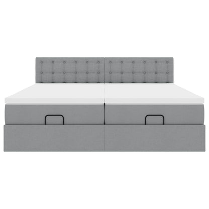 Ottoman bed met matrassen en LED's 180x200cm stof lichtgrijs