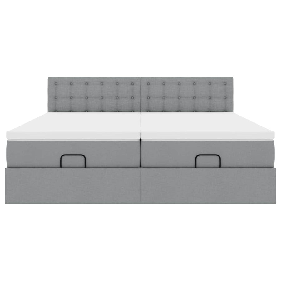 Ottoman bed met matrassen en LED's 180x200cm stof lichtgrijs