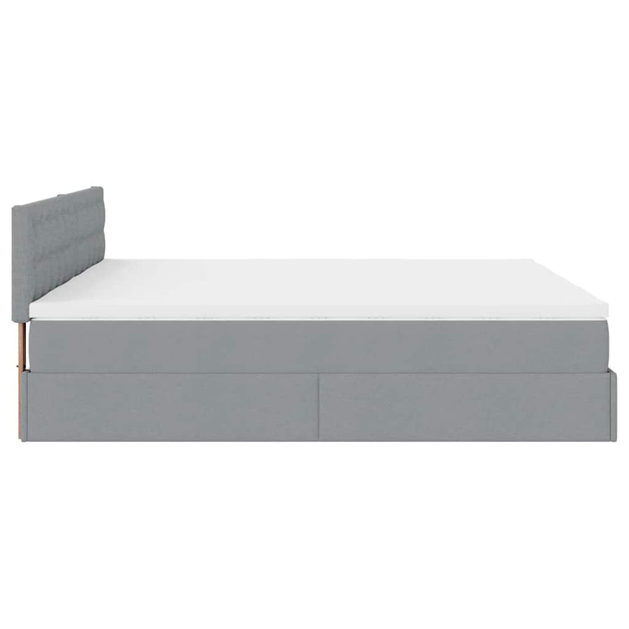 Ottoman bed met matrassen en LED's 180x200cm stof lichtgrijs